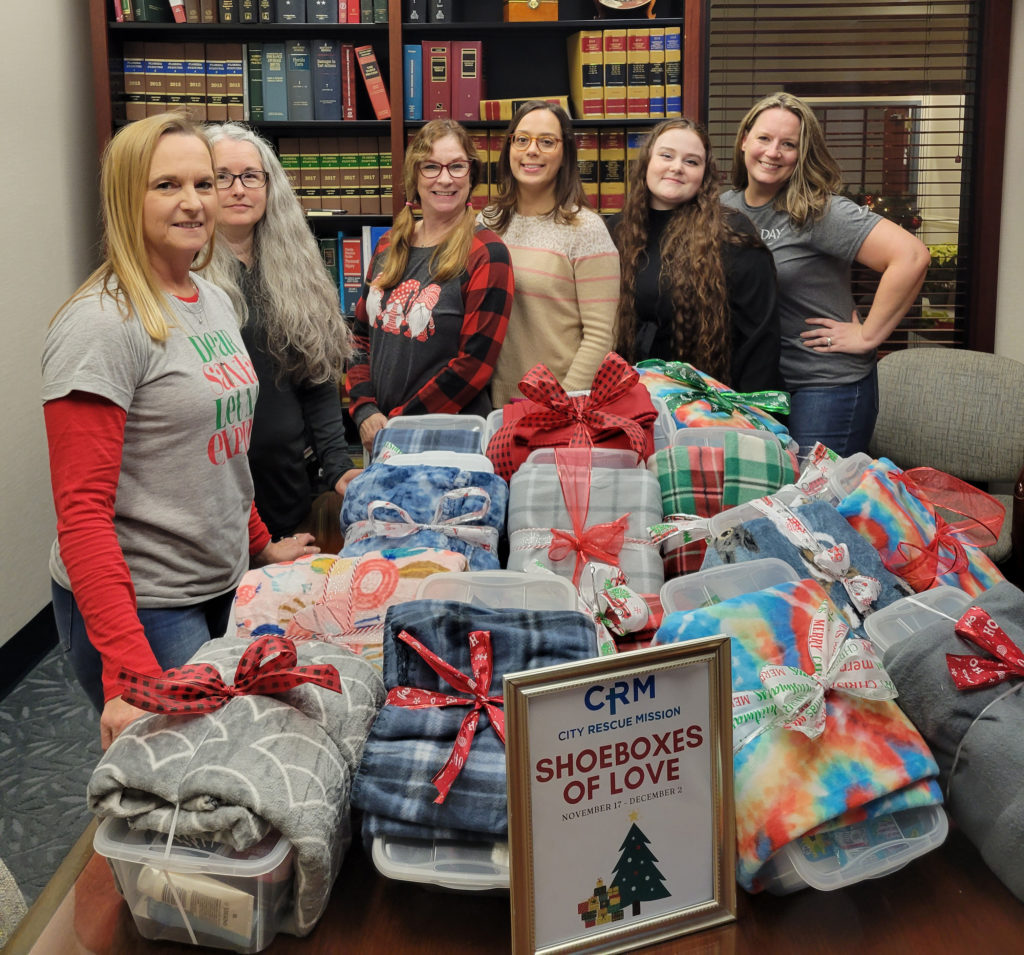 Taylor Day Law donates Shoeboxes of Love to City Rescue Mission